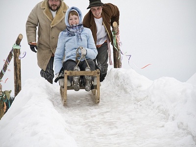 People enjoy the fun of sleigh riding during the Maslenitsa holiday